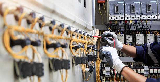 Professional Electrician technician working in Oak Hill, OH